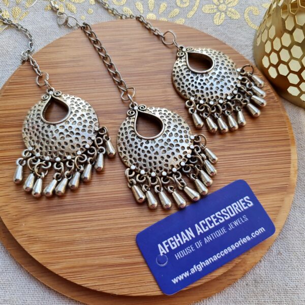 Antique oxidized tika