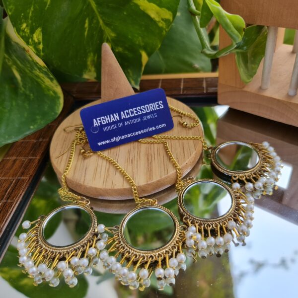 Antique mirror tika