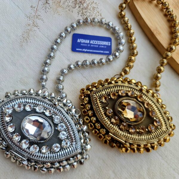 Antique handcrafted metalic GHUNGHRO eye clutch/bag