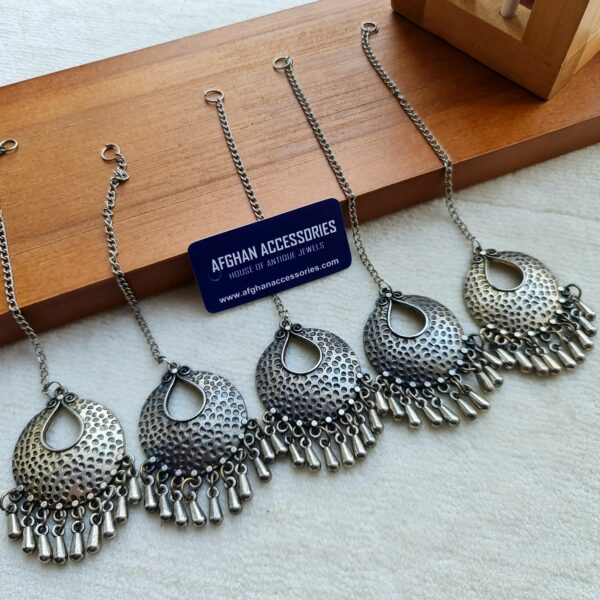 Antique oxidized tika