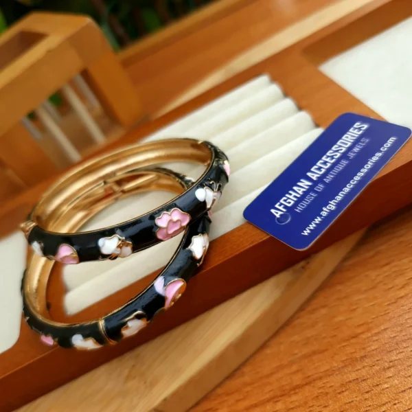Black meenakari bangle pair with a glossy finish